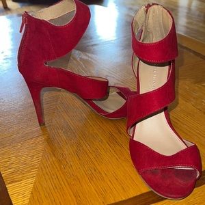 Used red Christian Siriano hells